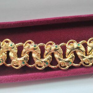 Kamrose and Cross goldtone link bracelet with faux emeralds